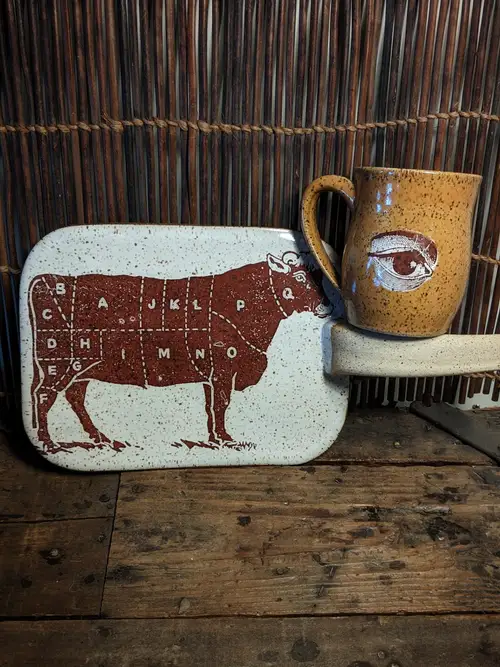 Handmade ceramic pottery: Charcuterie Board and Eye Mug