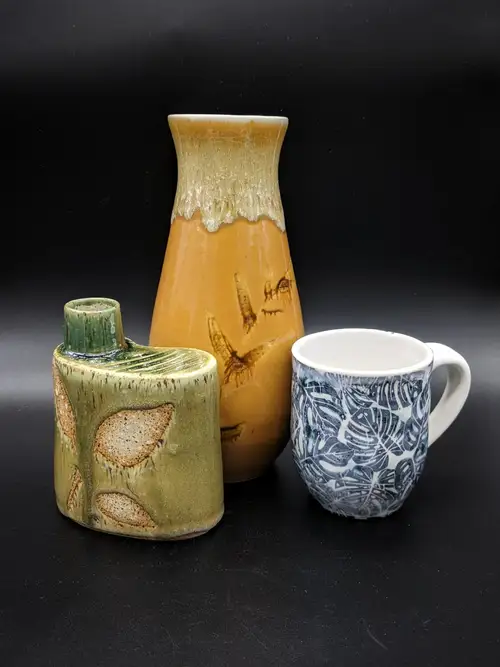 Handmade ceramic pottery: Leaf Flask - Reed Vase - Monstera Mug