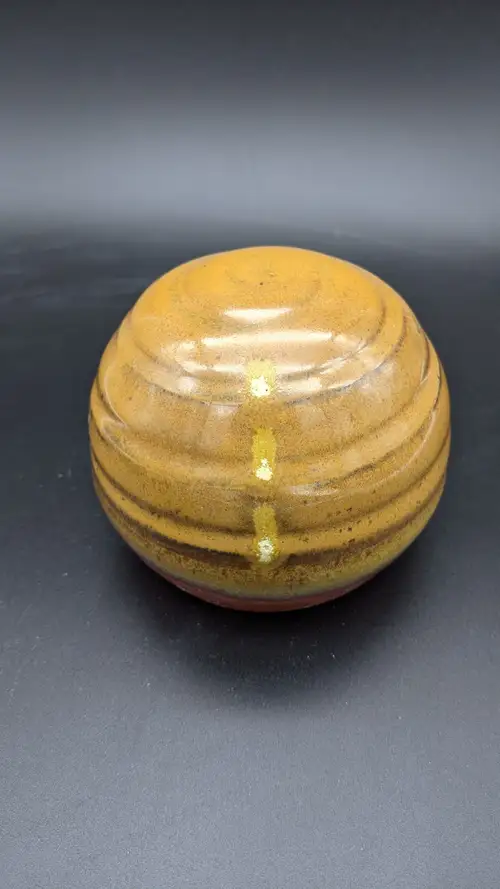Handmade ceramic pottery: Orange Paperweight